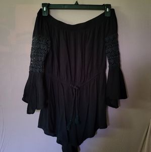 Blush Off Shoulder Romper size XL but fits more like a Medium.